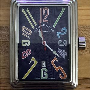 Stuhrling Uptown Ozzie Swiss Quartz Watch with a blue leather strap.